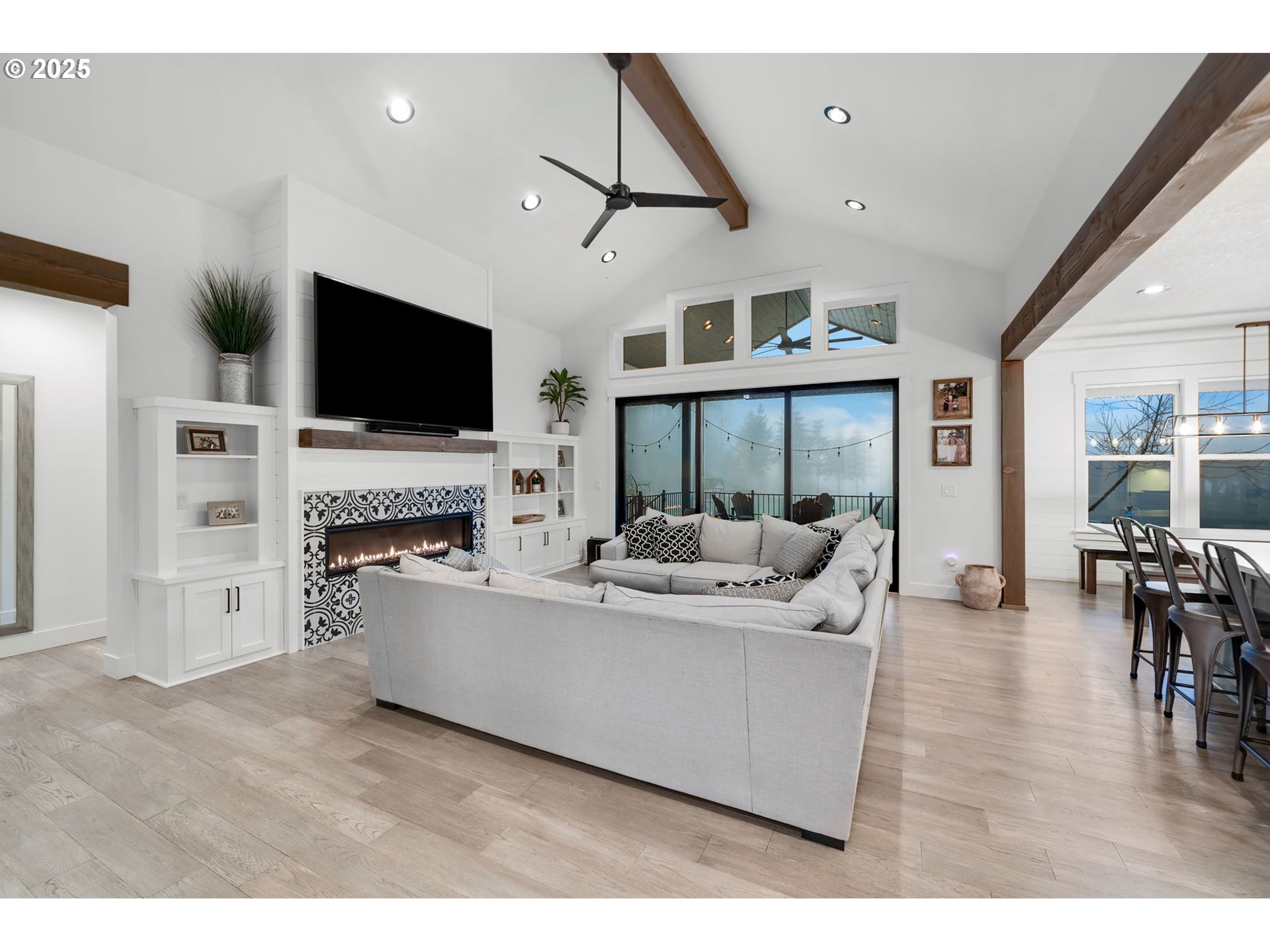 17211 Northeast Yacolt Mountain Road Yacolt, WA 98675 - Photo 9 of 44 a living room with furniture and a flat screen tv