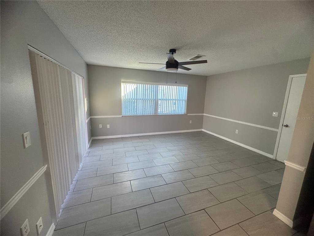 13016 Sirius Lane Hudson, FL 34667 - Photo 13 of 13 a view of an empty room with a window