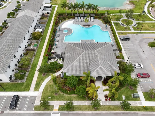 an aerial view of a house with outdoor space