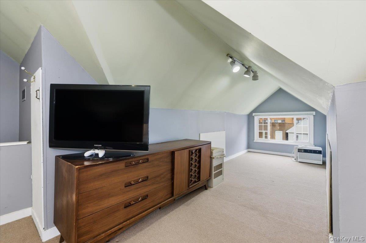 1617 Mahan Avenue Bronx, NY 10461 - Photo 17 of 29 a room with furniture and flat screen tv