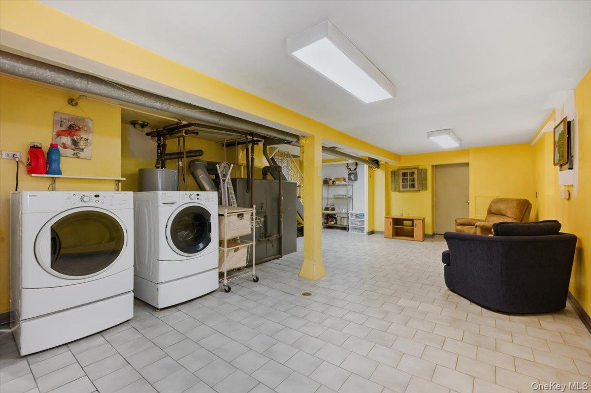 1617 Mahan Avenue Bronx, NY 10461 - Photo 18 of 29 a view of a storage & utility room with washer and dryer