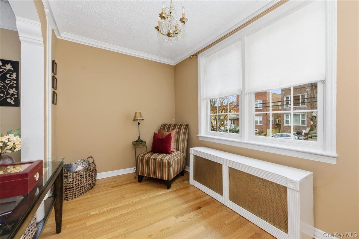 1617 Mahan Avenue Bronx, NY 10461 - Photo 6 of 29 a living room with furniture and a window