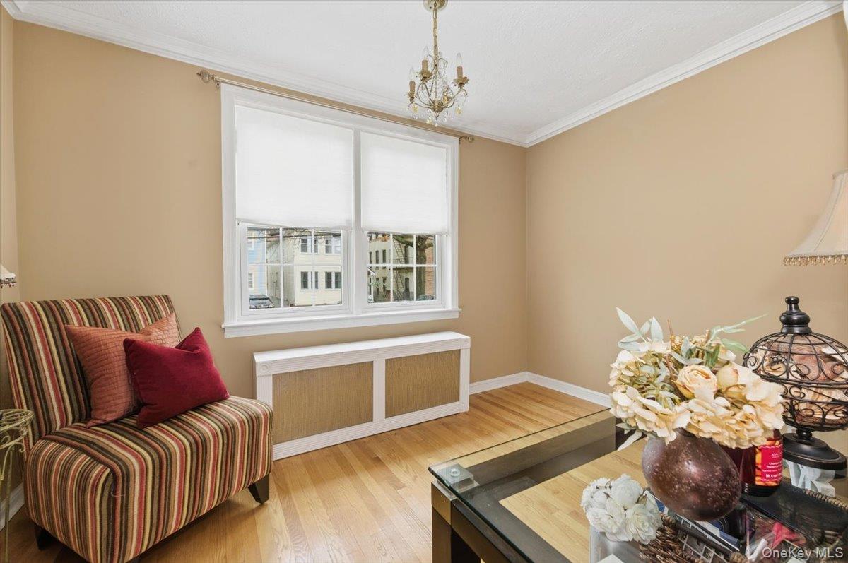 1617 Mahan Avenue Bronx, NY 10461 - Photo 7 of 29 a living room with furniture and a window
