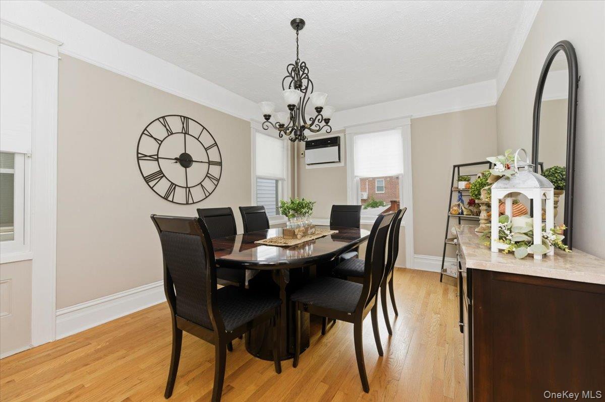 1617 Mahan Avenue Bronx, NY 10461 - Photo 8 of 29 a view of a dining room with furniture and window