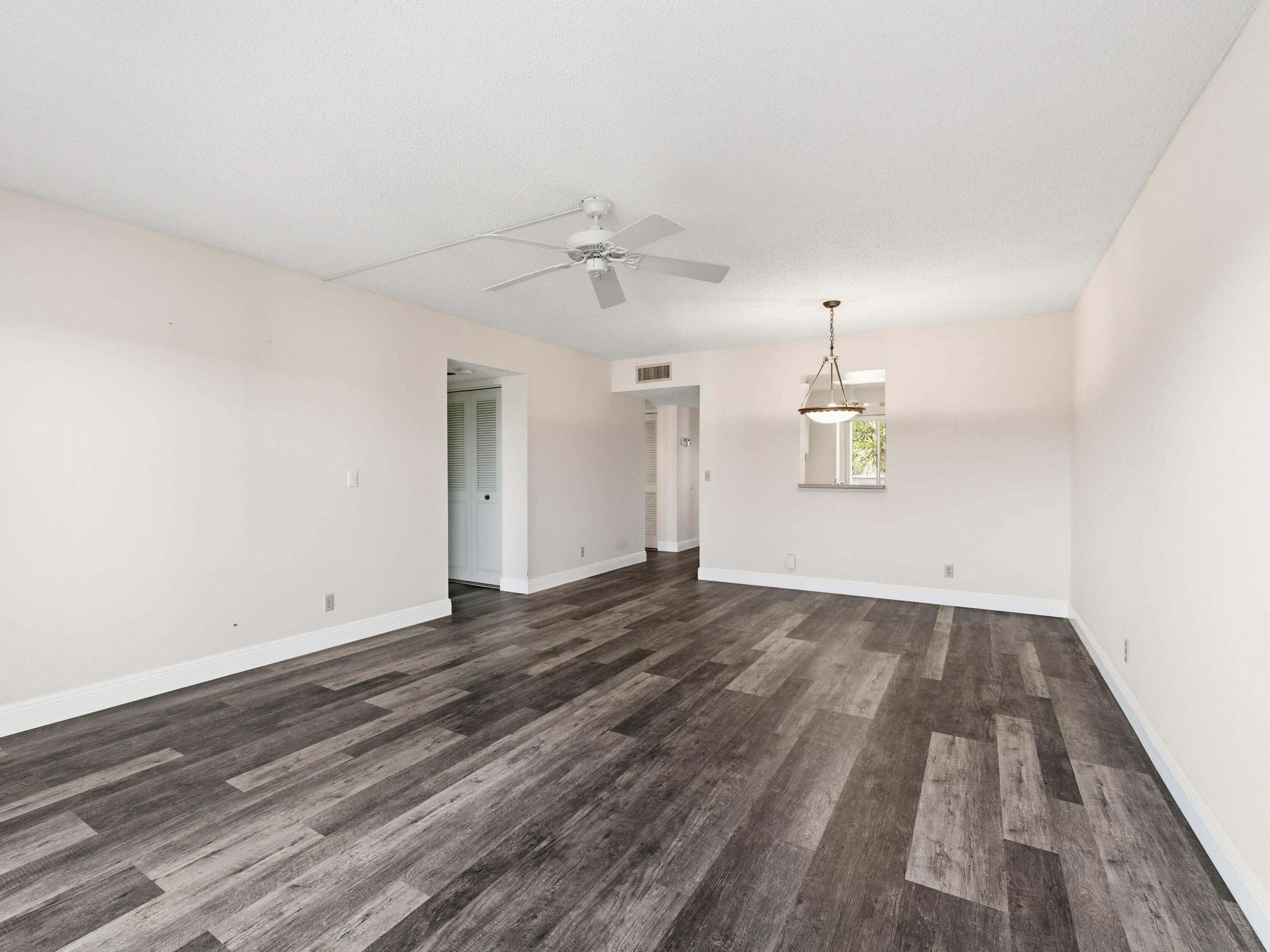 14310 Strathmore Lane, Unit 402 Delray Beach, FL 33446 - Photo 16 of 54 Living to Dining