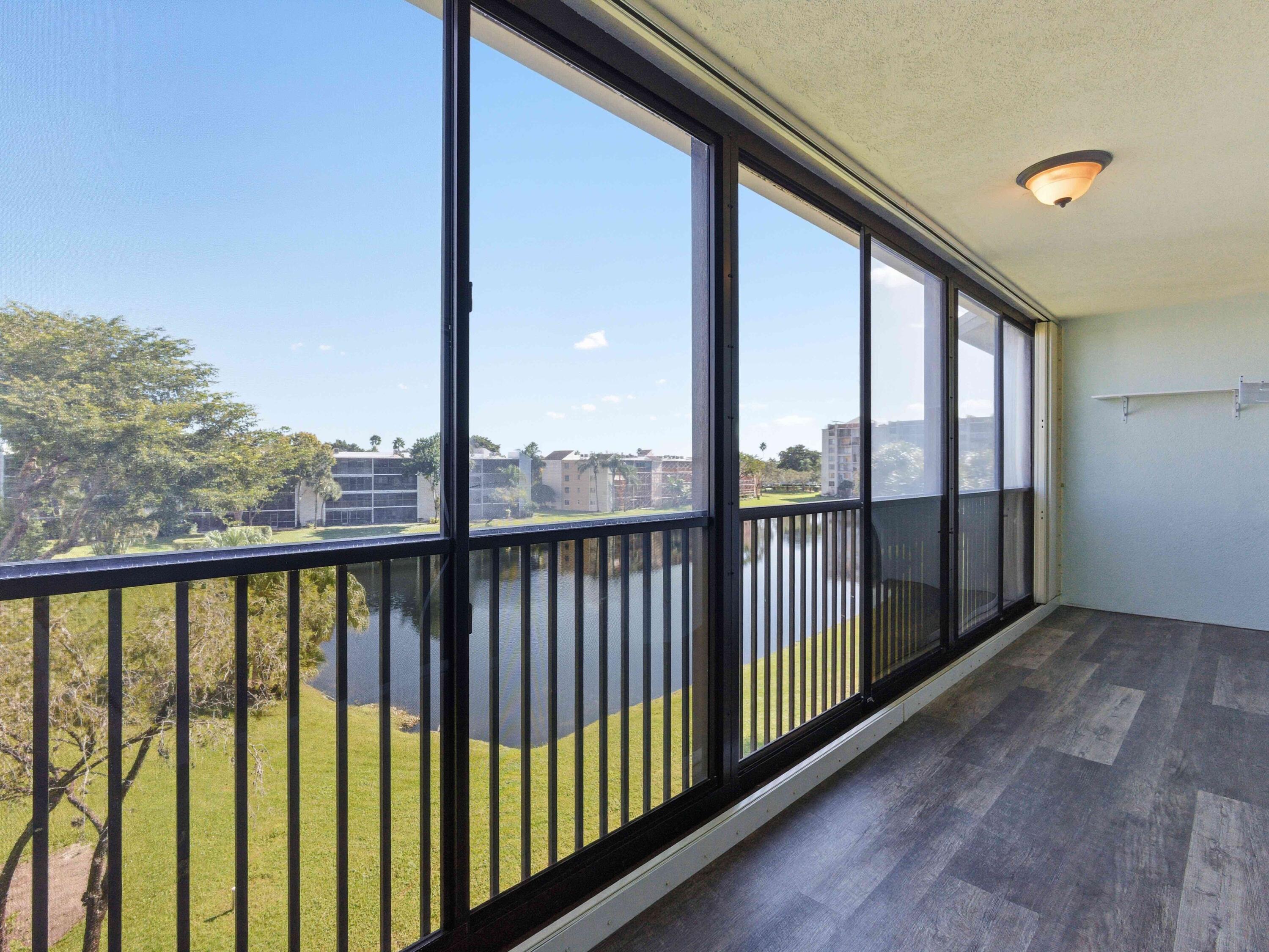 14310 Strathmore Lane, Unit 402 Delray Beach, FL 33446 - Photo 19 of 54 Enclosed Balcony