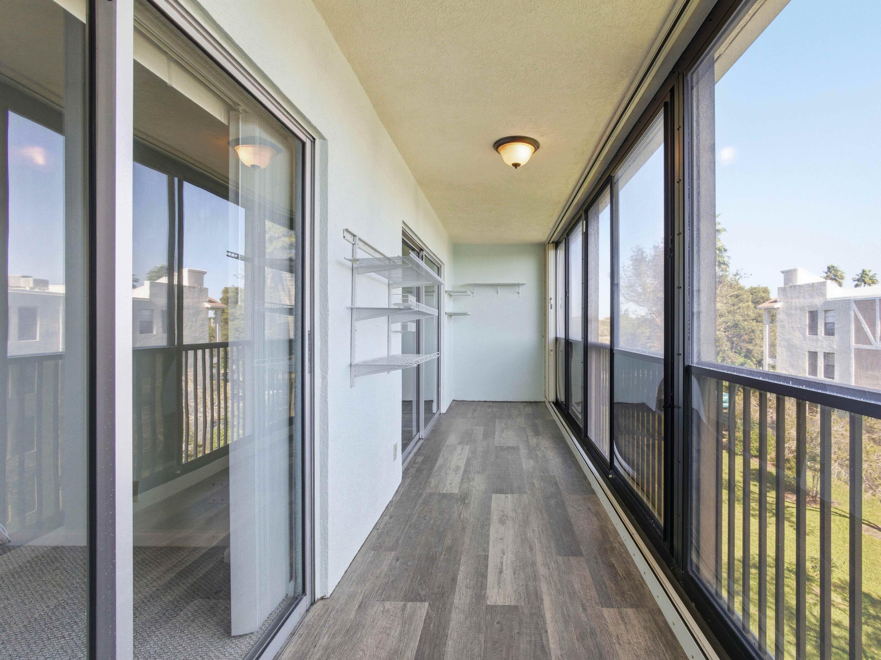 14310 Strathmore Lane, Unit 402 Delray Beach, FL 33446 - Photo 20 of 54 Enclosed Balcony
