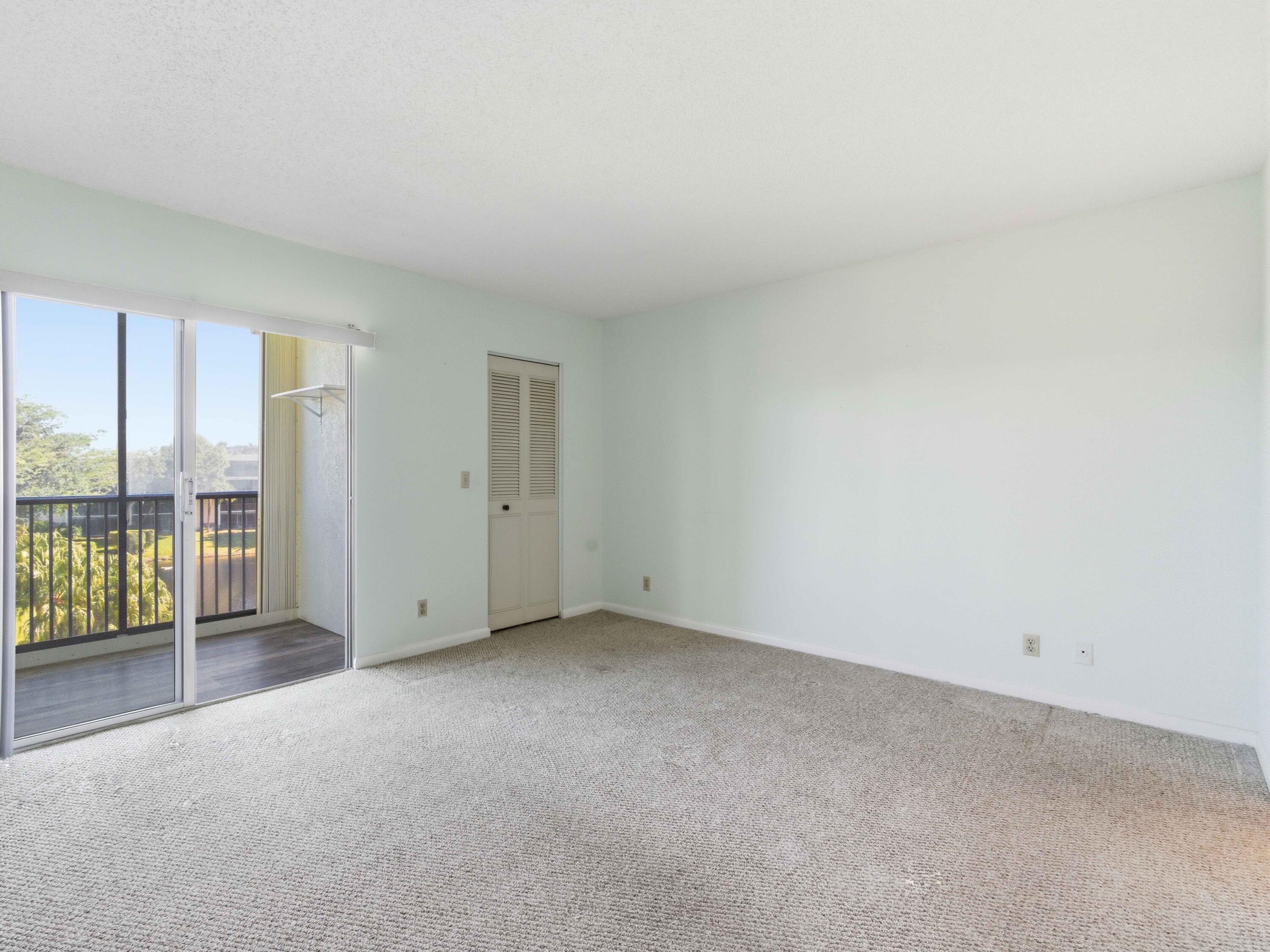 14310 Strathmore Lane, Unit 402 Delray Beach, FL 33446 - Photo 24 of 54 Primary Bedroom