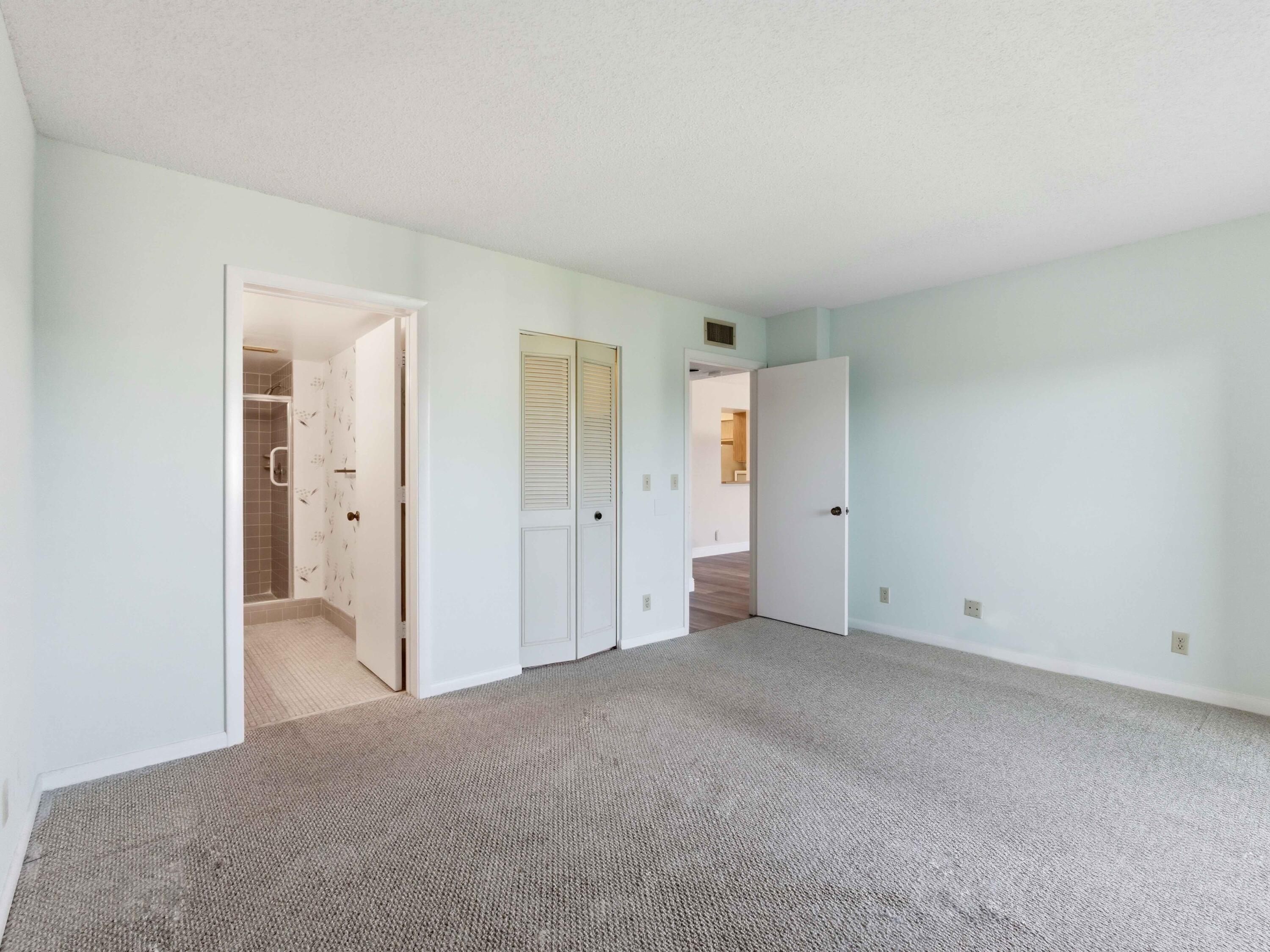 14310 Strathmore Lane, Unit 402 Delray Beach, FL 33446 - Photo 25 of 54 Primary Bedroom