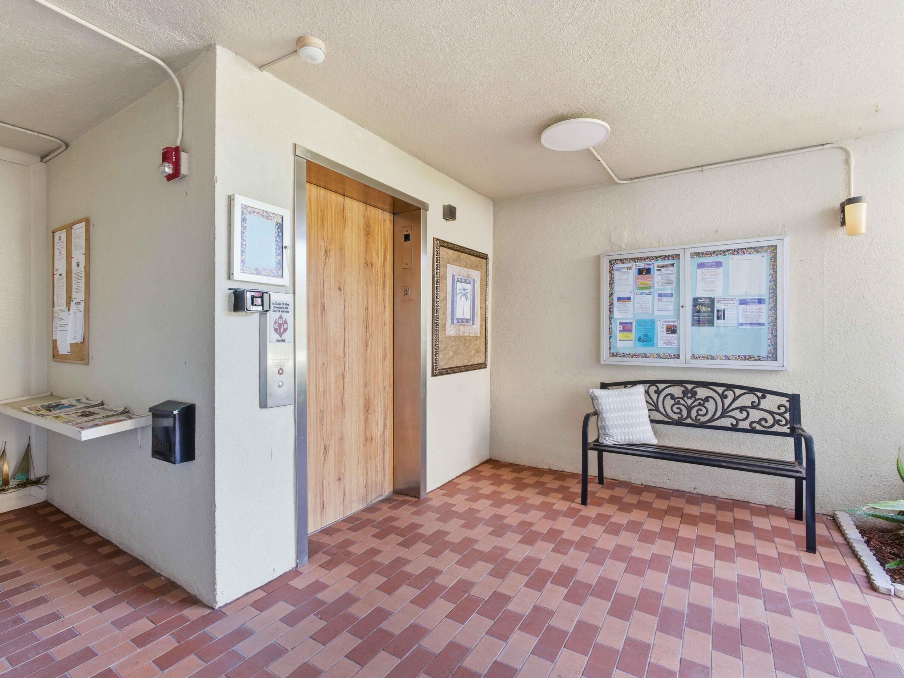 14310 Strathmore Lane, Unit 402 Delray Beach, FL 33446 - Photo 34 of 54 Building Lobby Elevator