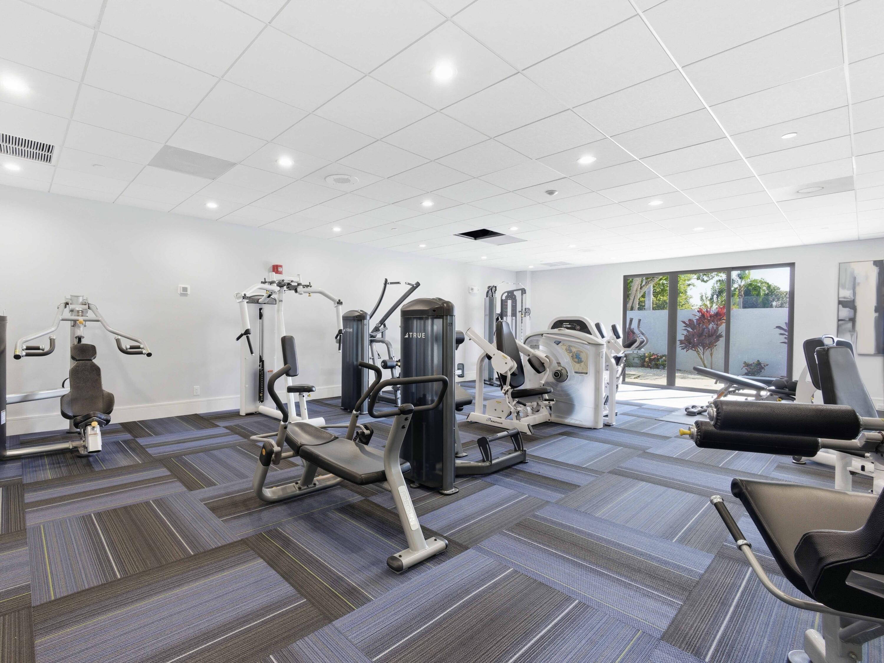 14310 Strathmore Lane, Unit 402 Delray Beach, FL 33446 - Photo 42 of 54 Clubhouse Gym Weights