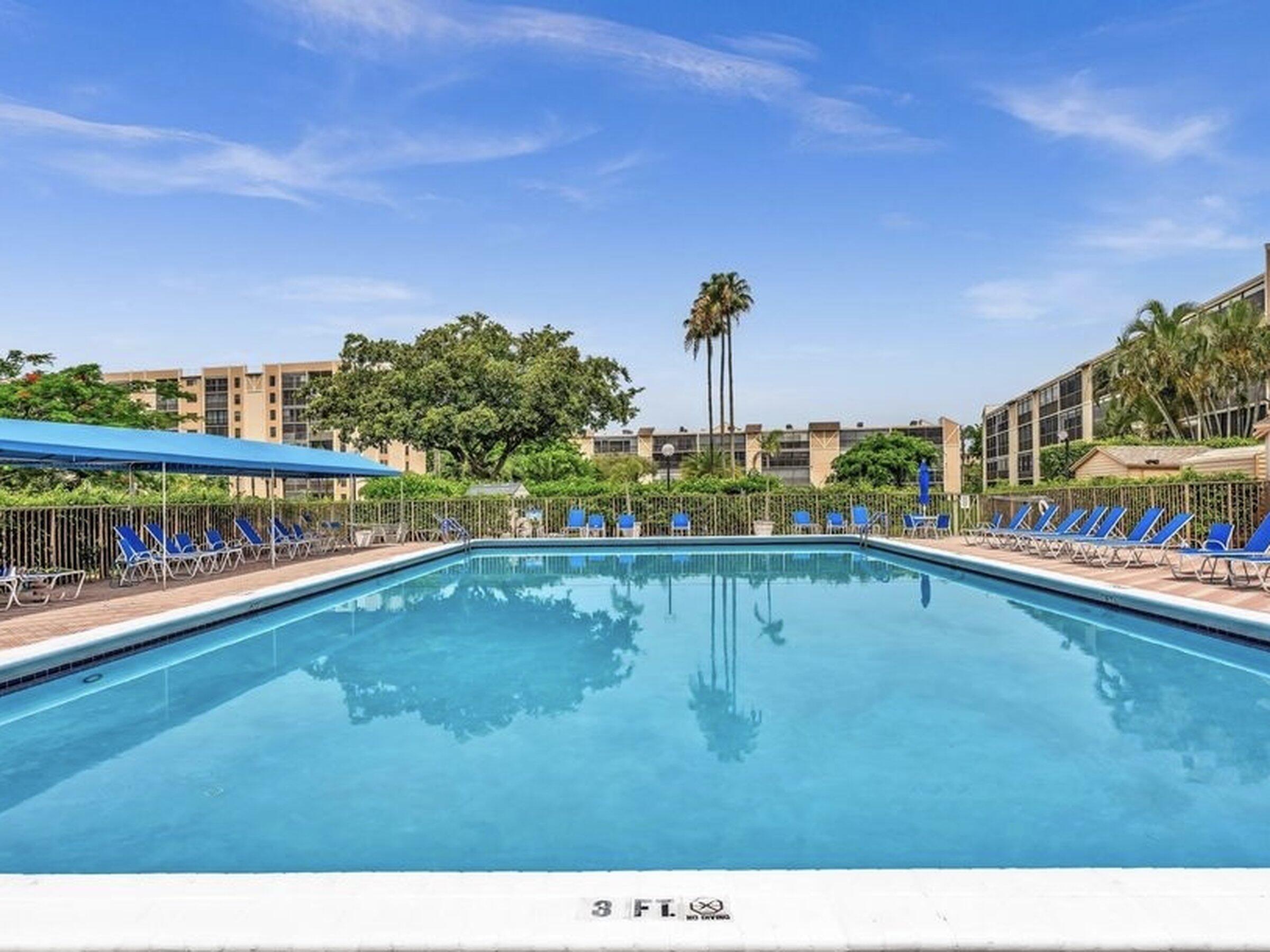 14310 Strathmore Lane, Unit 402 Delray Beach, FL 33446 - Photo 45 of 54 Resort-Style Pool