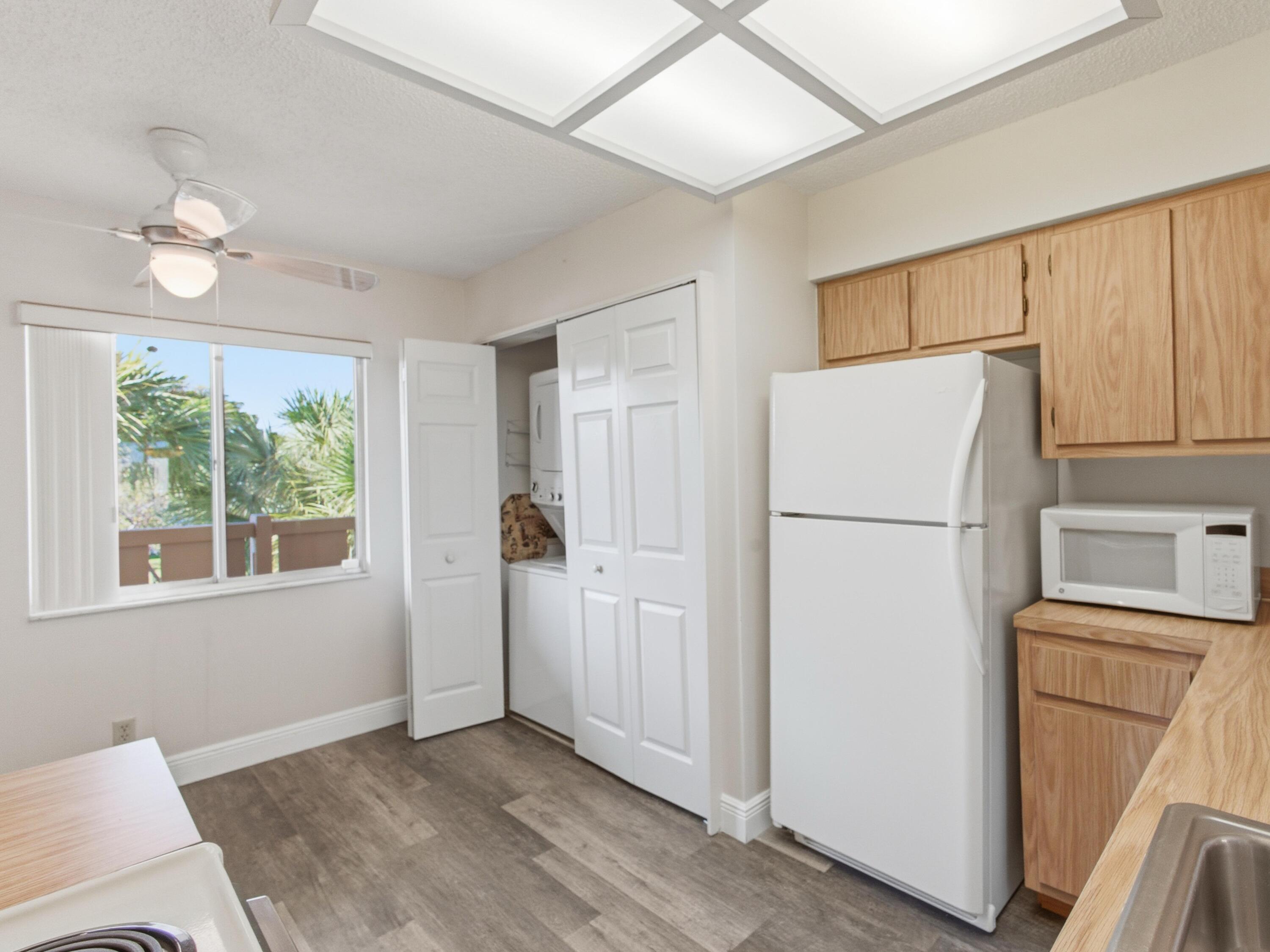 14310 Strathmore Lane, Unit 402 Delray Beach, FL 33446 - Photo 9 of 54 Kitchen Laundry