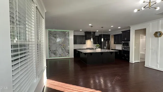 a bedroom with furniture and windows