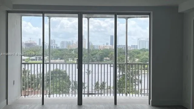 a view of a city street from a balcony