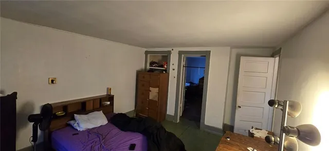 a room with furniture and wooden floor