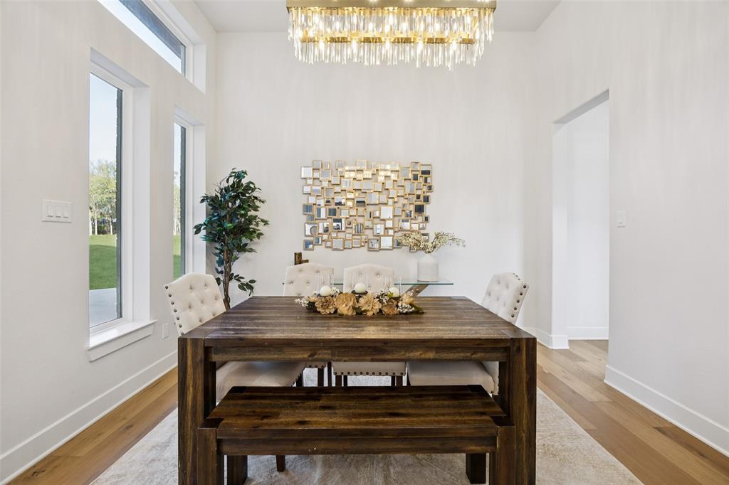 4120 Ridgecrest Drive Flower Mound, TX 75022 - Photo 18 of 40 a view of a dining room with furniture and window
