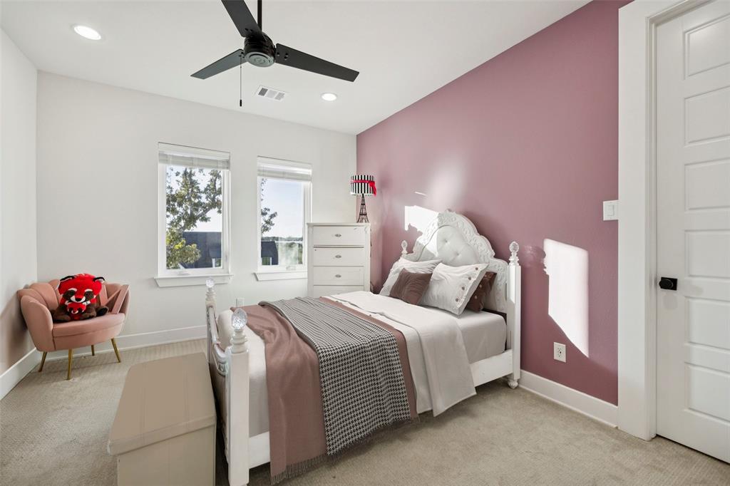 4120 Ridgecrest Drive Flower Mound, TX 75022 - Photo 31 of 40 a bedroom with a bed and dresser