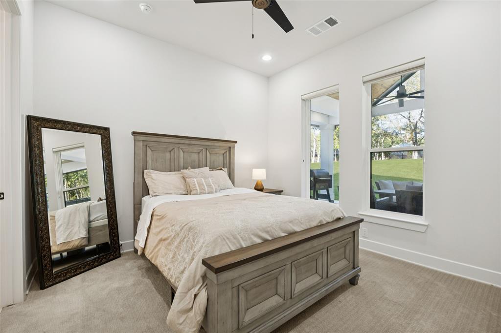 4120 Ridgecrest Drive Flower Mound, TX 75022 - Photo 32 of 40 a bedroom with a bed and a window