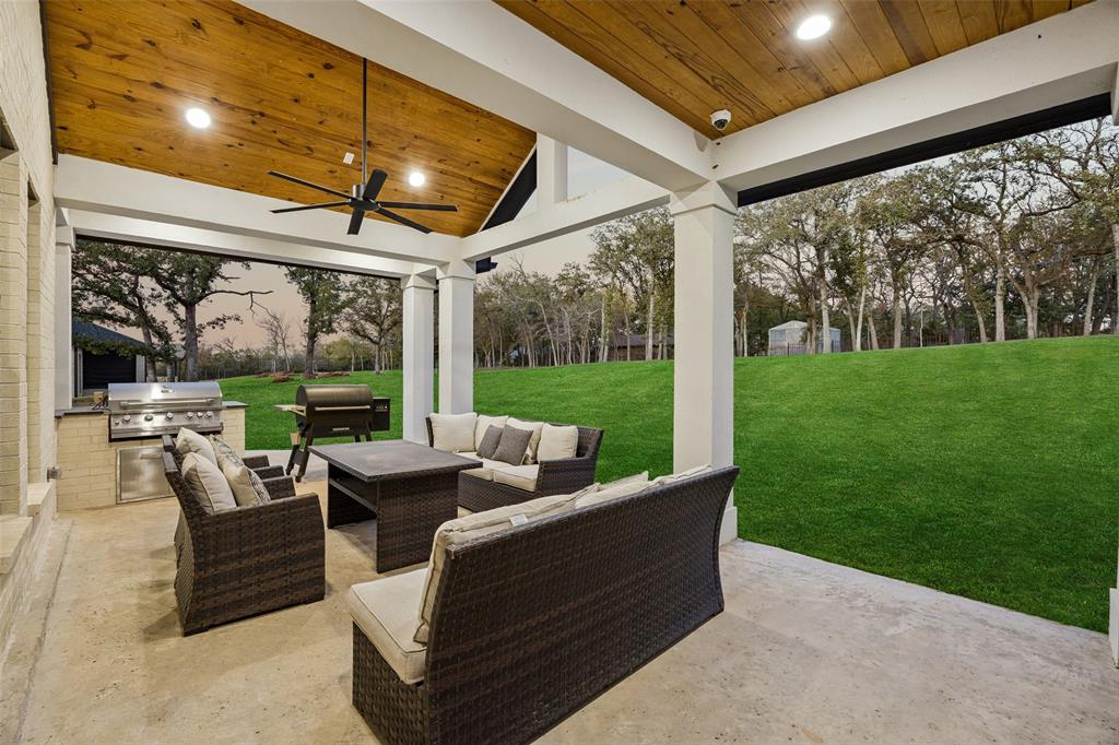 4120 Ridgecrest Drive Flower Mound, TX 75022 - Photo 34 of 40 a outdoor space with patio furniture and garden