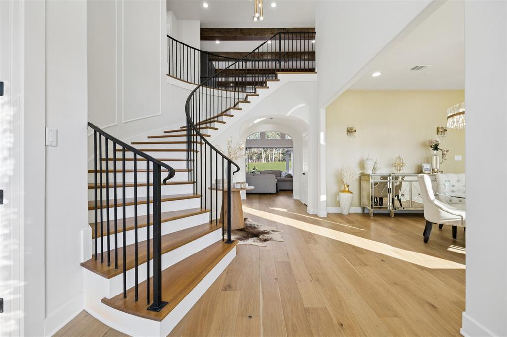 4120 Ridgecrest Drive Flower Mound, TX 75022 - Photo 5 of 40 a view of entryway and hall with wooden floor
