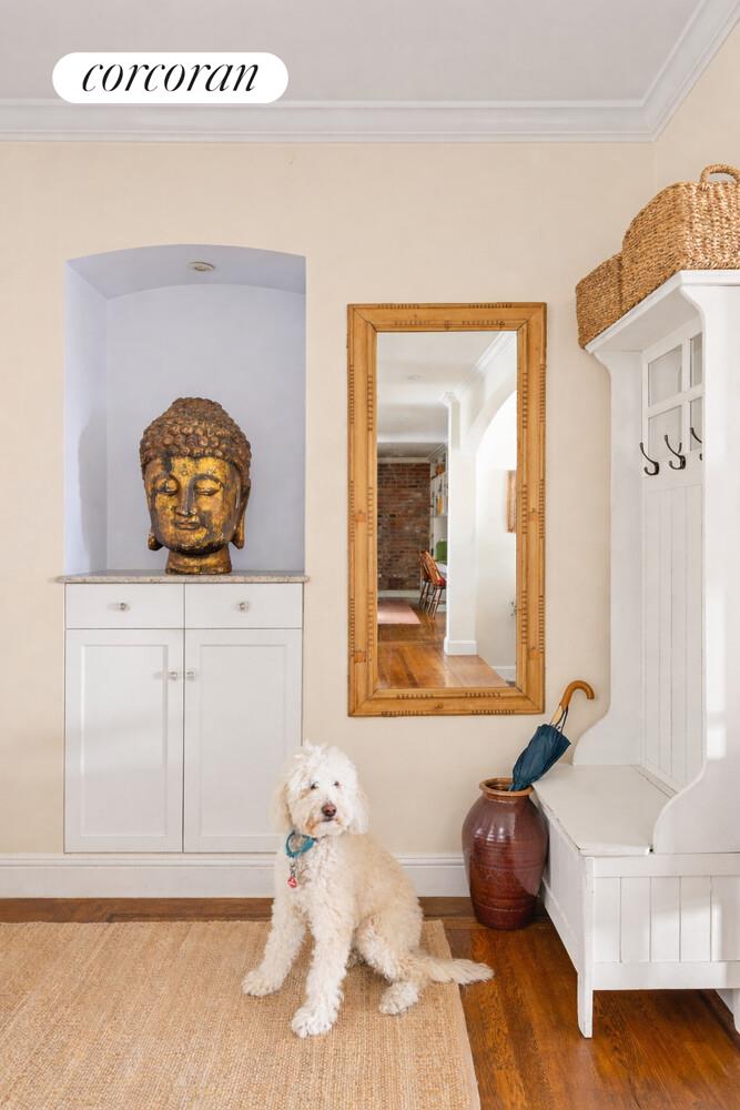 519 East 86th Street, Unit 6D Manhattan, NY 10028 - Photo 2 of 19 a bedroom with a bed and window