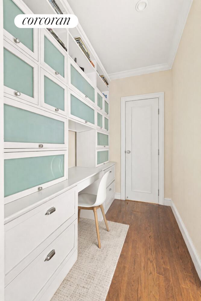 519 East 86th Street, Unit 6D Manhattan, NY 10028 - Photo 8 of 19 a view of a bedroom with furniture and wooden floor