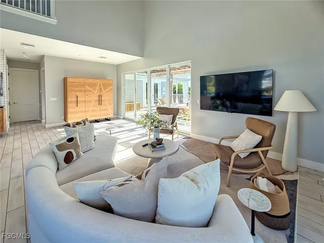 a kitchen with stainless steel appliances a sink stove and cabinets