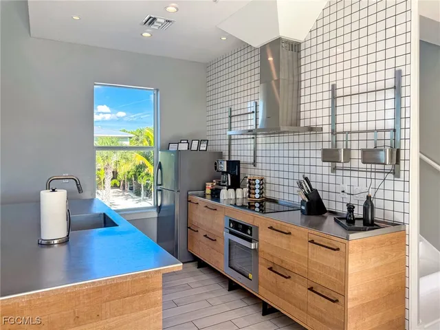 a bedroom with a bed window and couch