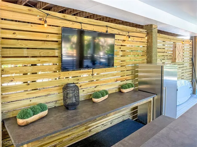 a view of a swimming pool with a lounge chair