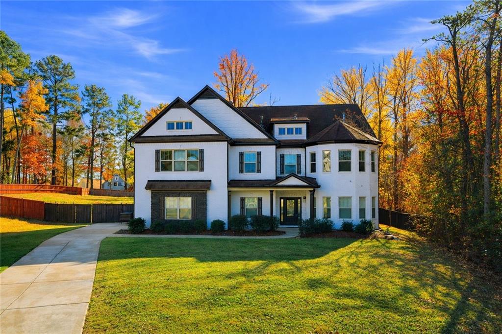 a front view of a house with swimming pool