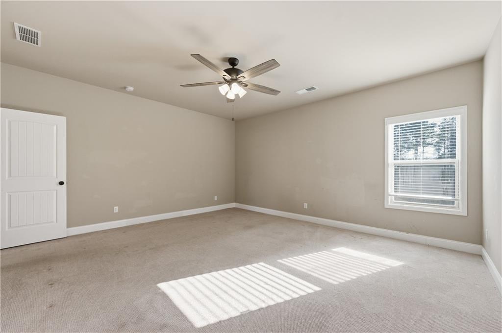 2813 Carrick Court Powder Springs, GA 30127 - Photo 29 of 47 a view of an empty room with a window
