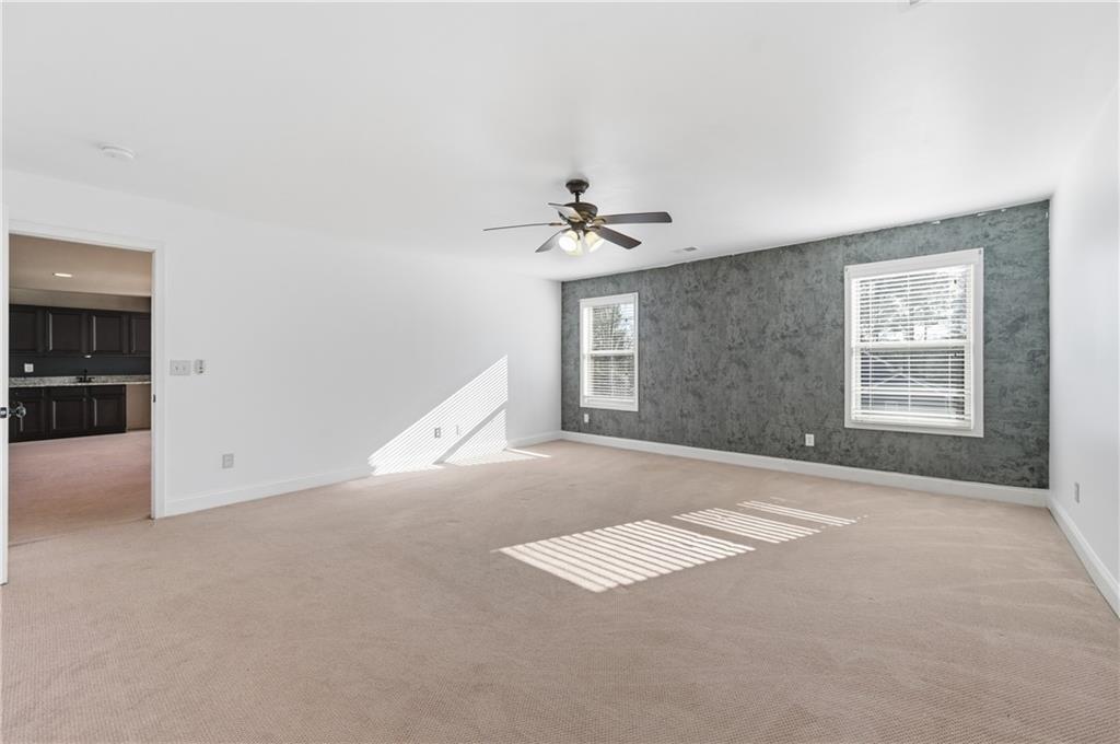 2813 Carrick Court Powder Springs, GA 30127 - Photo 33 of 47 an empty room with windows and closet