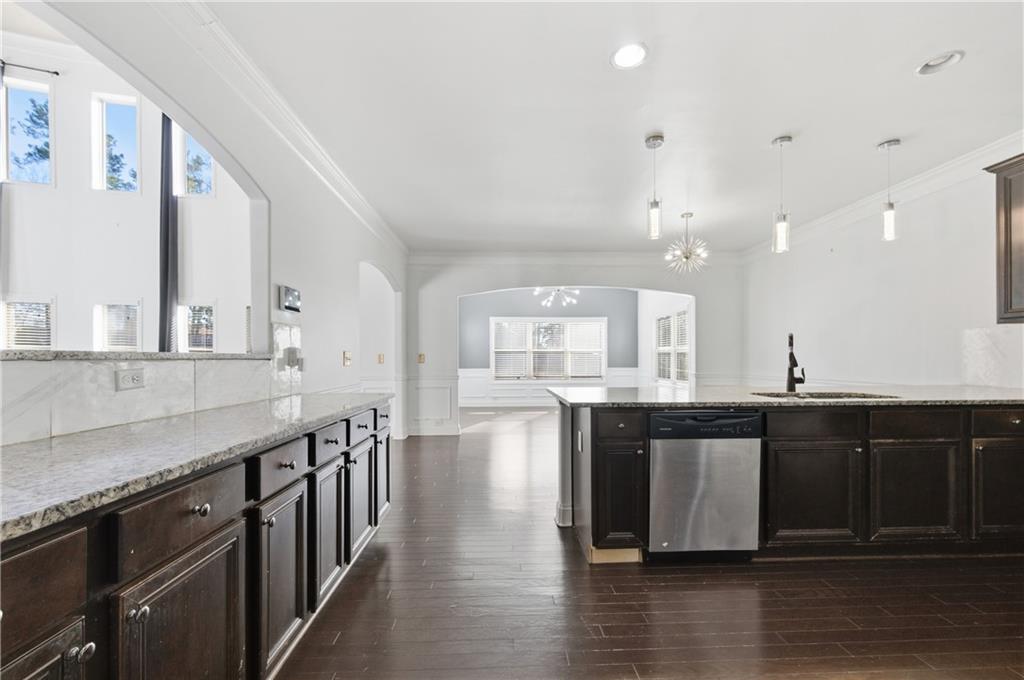 2813 Carrick Court Powder Springs, GA 30127 - Photo 9 of 47 a large kitchen with lots of counter space and a sink