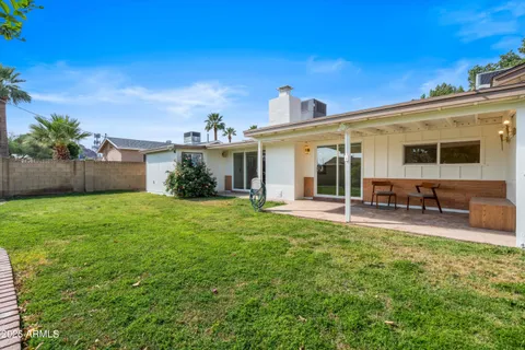 a house view with a garden space