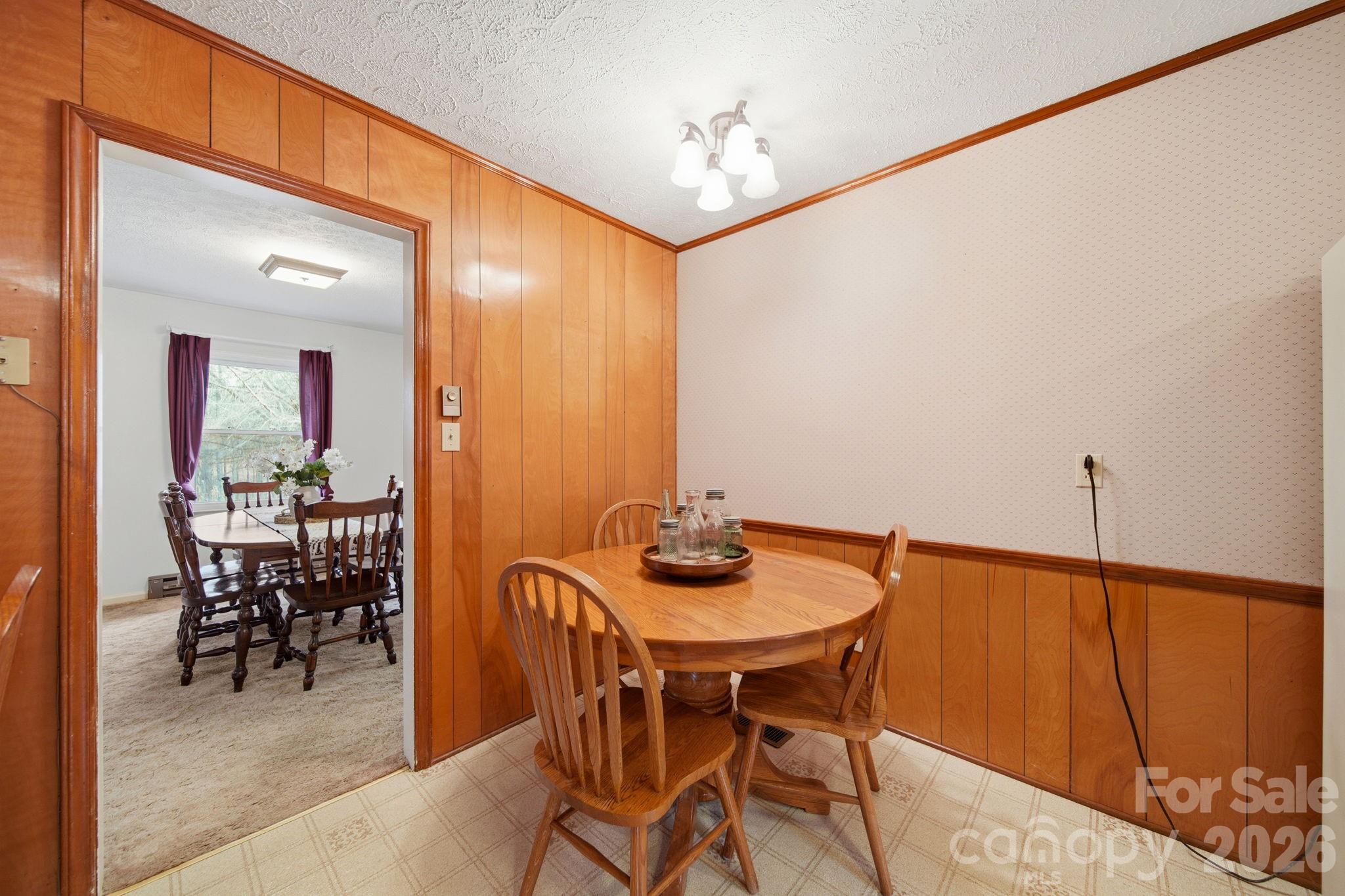 6418 Casar Road Casar, NC 28020 - Photo 14 of 38 a view of a dining room with furniture and chandelier