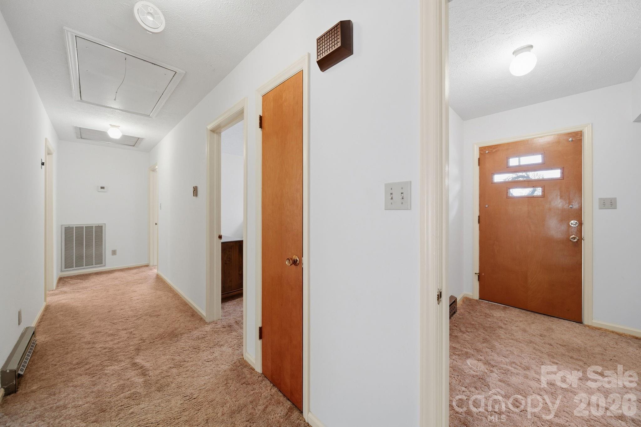 6418 Casar Road Casar, NC 28020 - Photo 23 of 38 a view of hallway with a bathroom and a shower