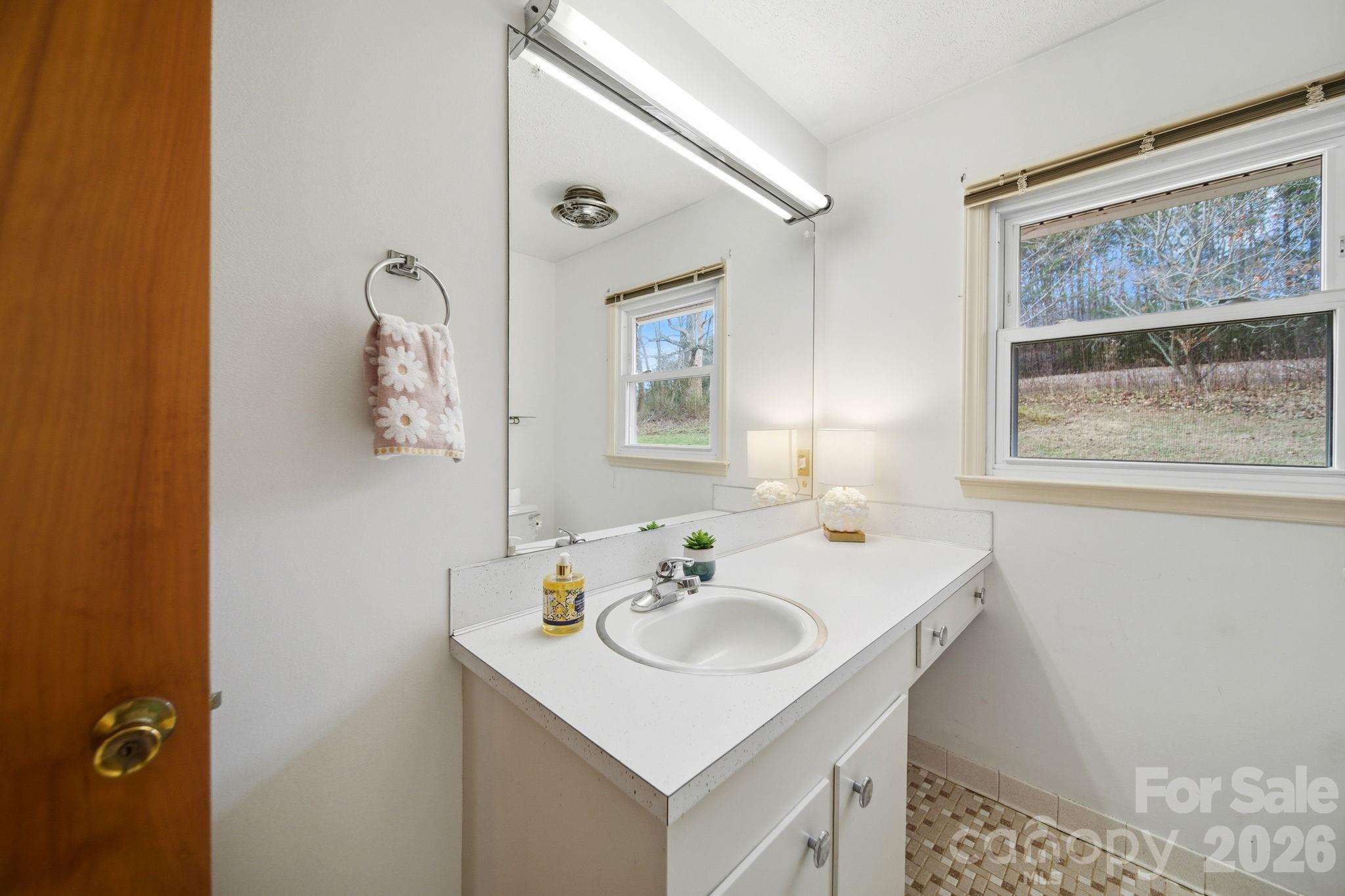 6418 Casar Road Casar, NC 28020 - Photo 28 of 38 a sink and a mirror