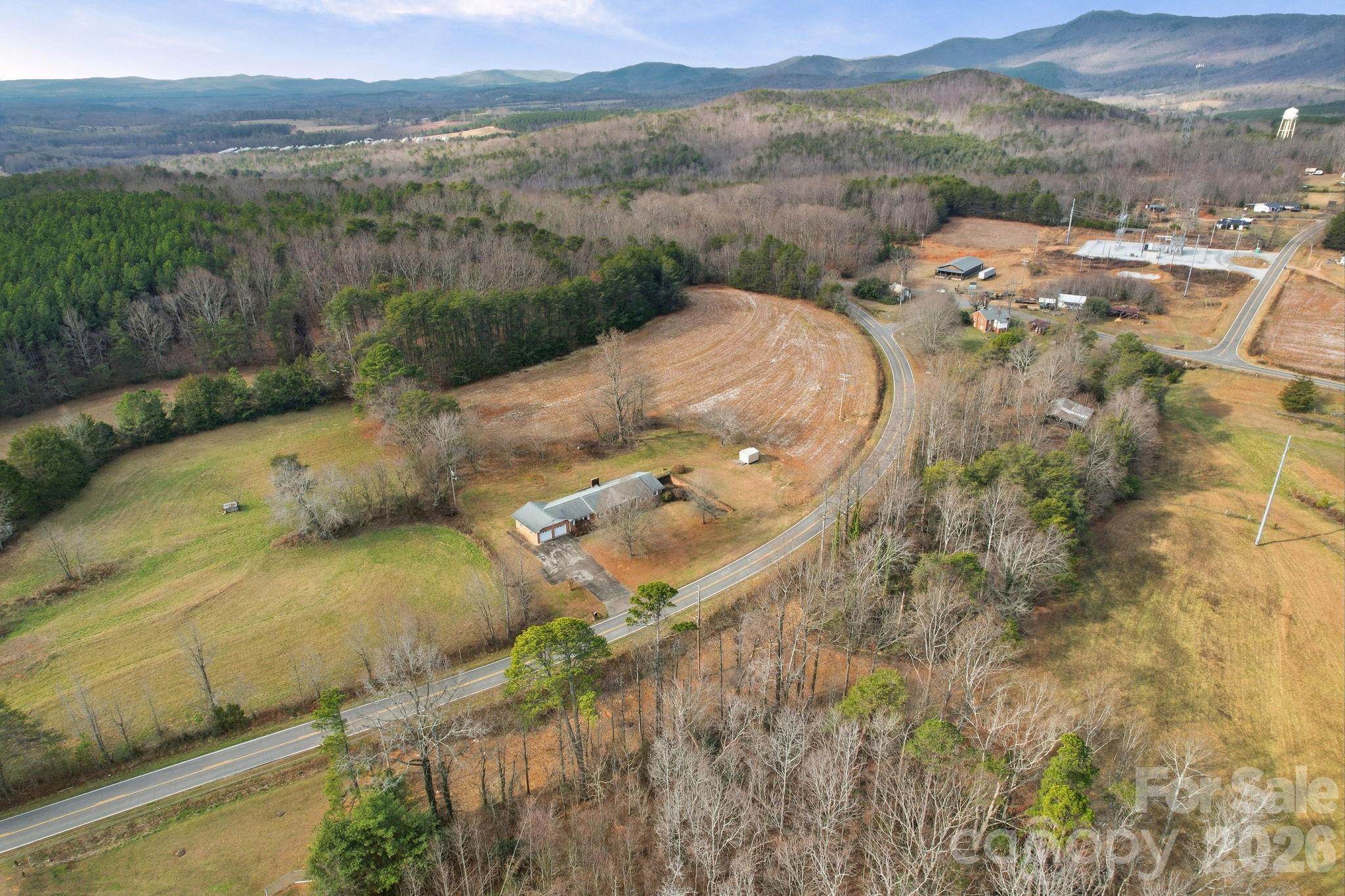 6418 Casar Road Casar, NC 28020 - Photo 36 of 38 a view of a lake with mountains in the background