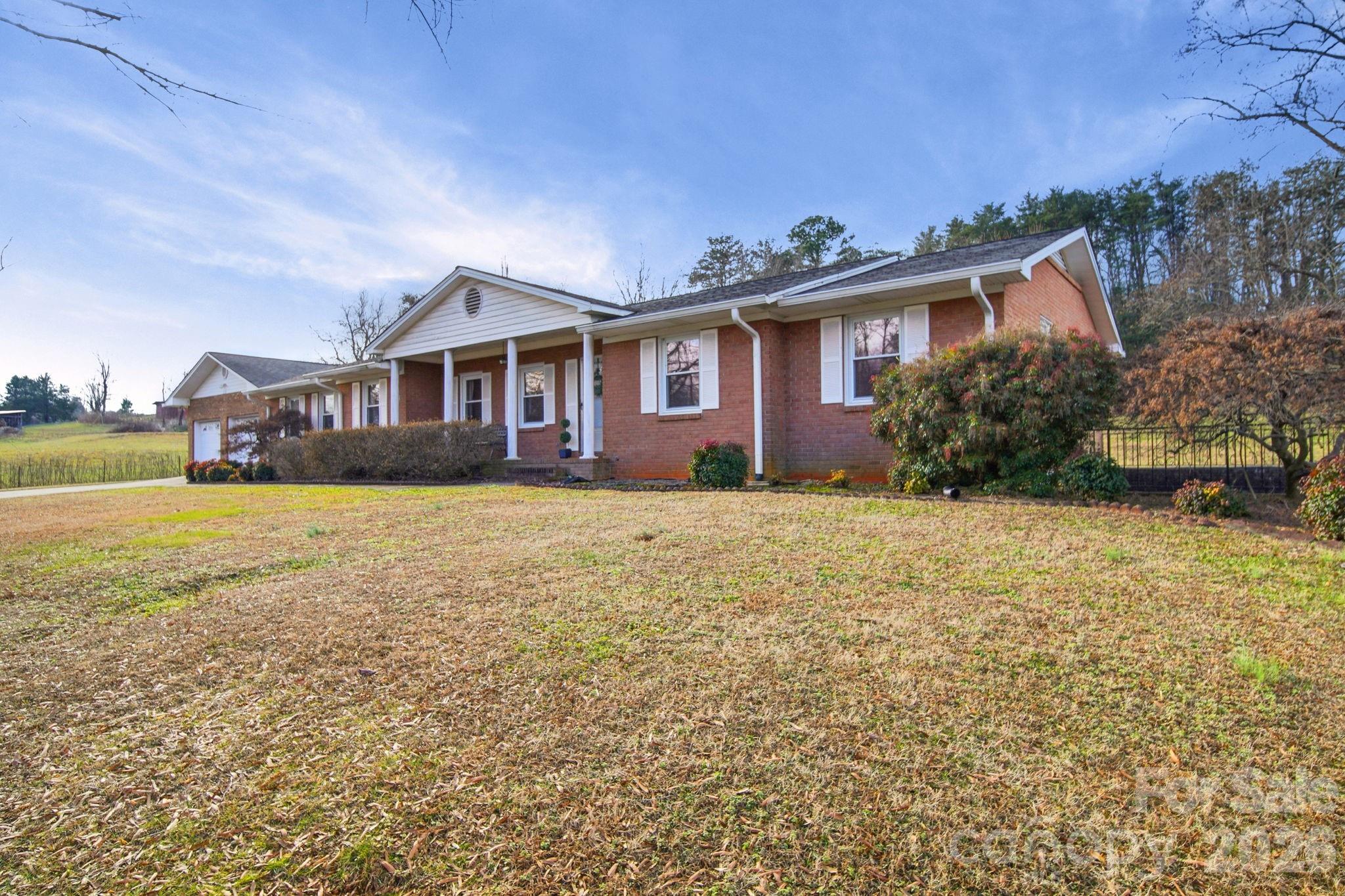 6418 Casar Road Casar, NC 28020 - Photo 4 of 38 a front view of house with yard and green space