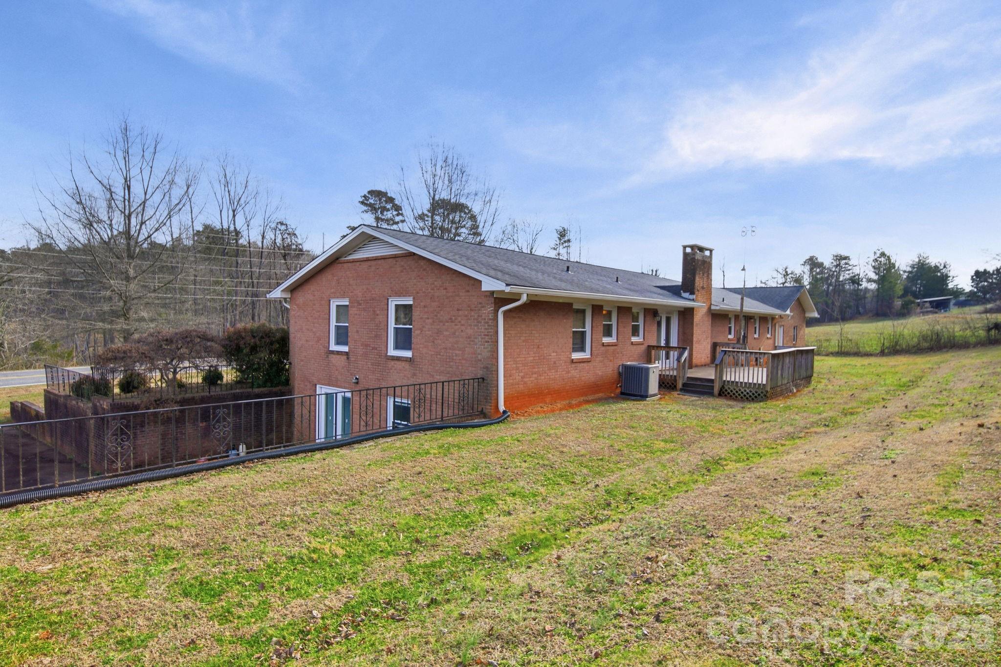 6418 Casar Road Casar, NC 28020 - Photo 5 of 38 a front view of a house with a yard