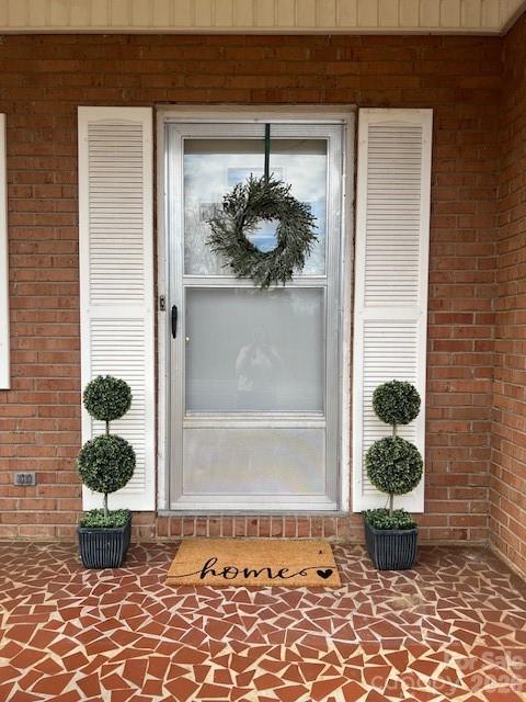 6418 Casar Road Casar, NC 28020 - Photo 8 of 38 a front view of a house and a potted plant