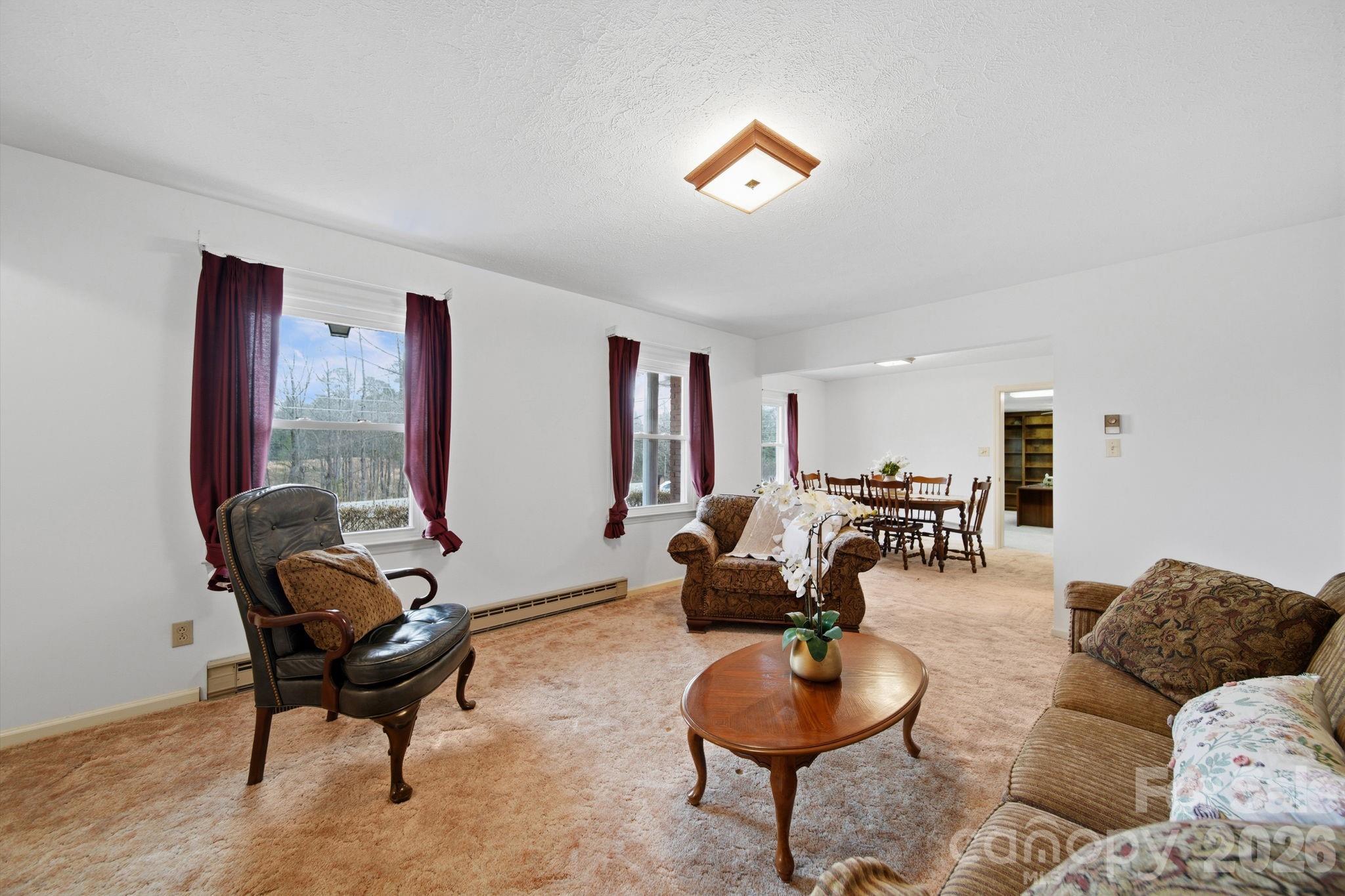 6418 Casar Road Casar, NC 28020 - Photo 10 of 38 a living room with furniture and a large window