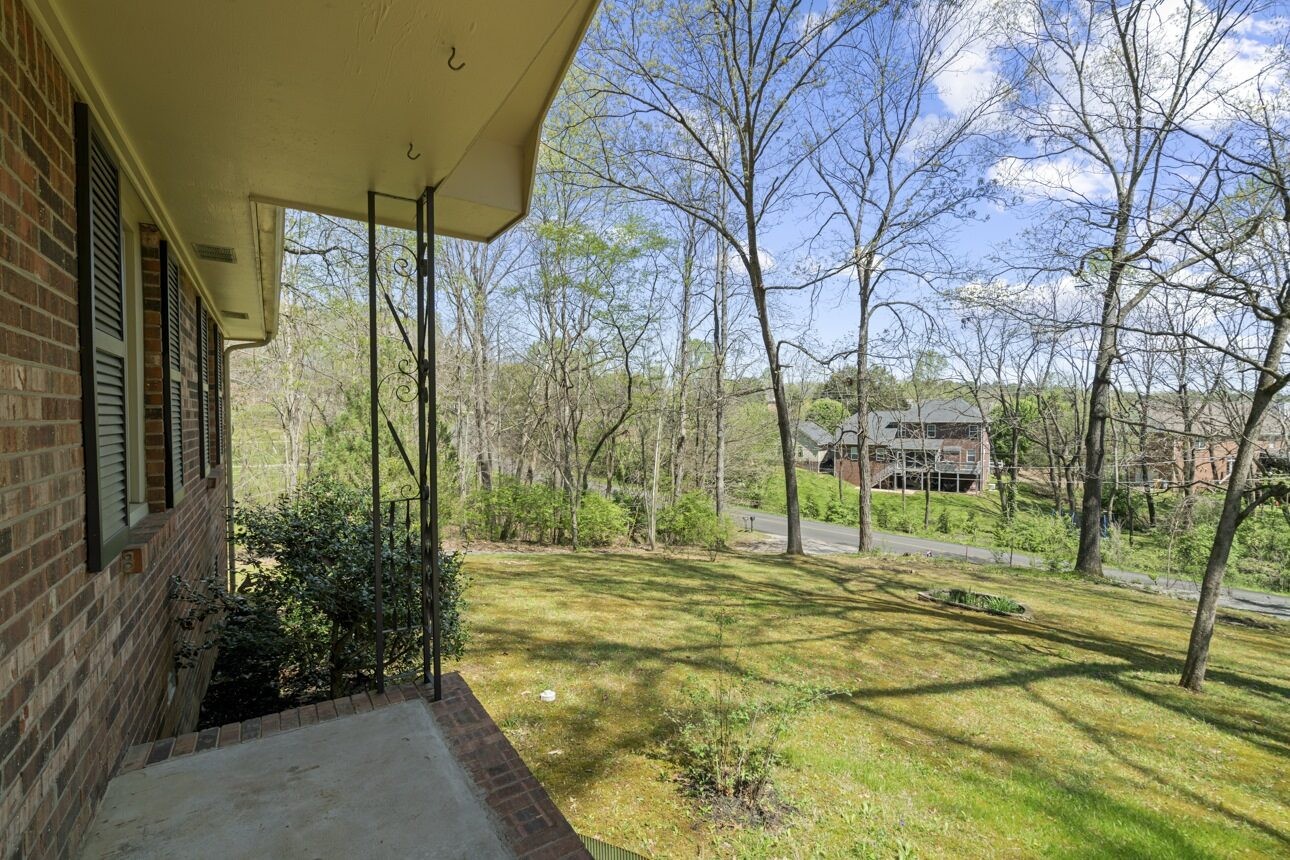 7704 Chester Road Fairview, TN 37062 - Photo 14 of 19 a swimming pool with trees in front of it