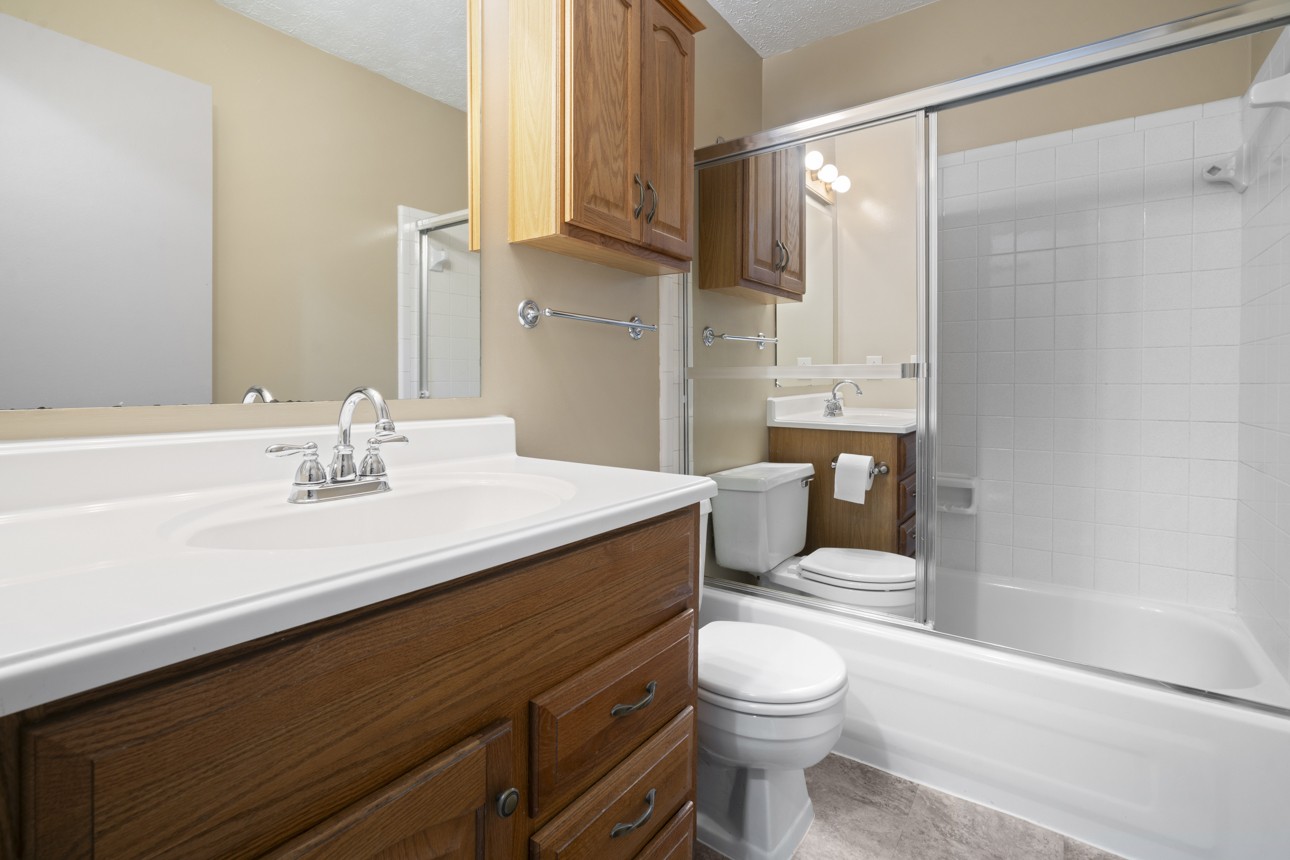 7704 Chester Road Fairview, TN 37062 - Photo 8 of 19 a bathroom with a sink a toilet and shower