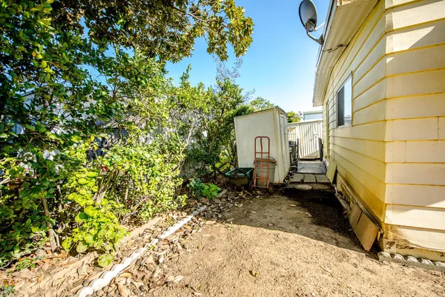 a view of a backyard with a garden