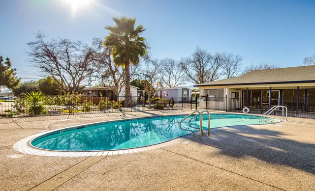 a view of a pathway with a yard