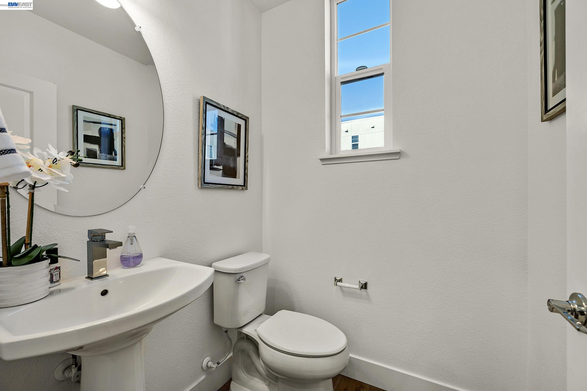 29259 Hub Court Hayward, CA 94544 - Photo 12 of 34 a bathroom with a sink mirror and toilet