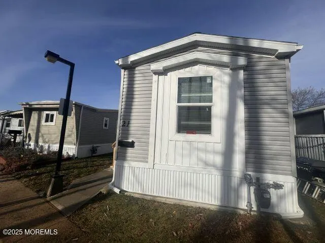 a front view of a house with stairs