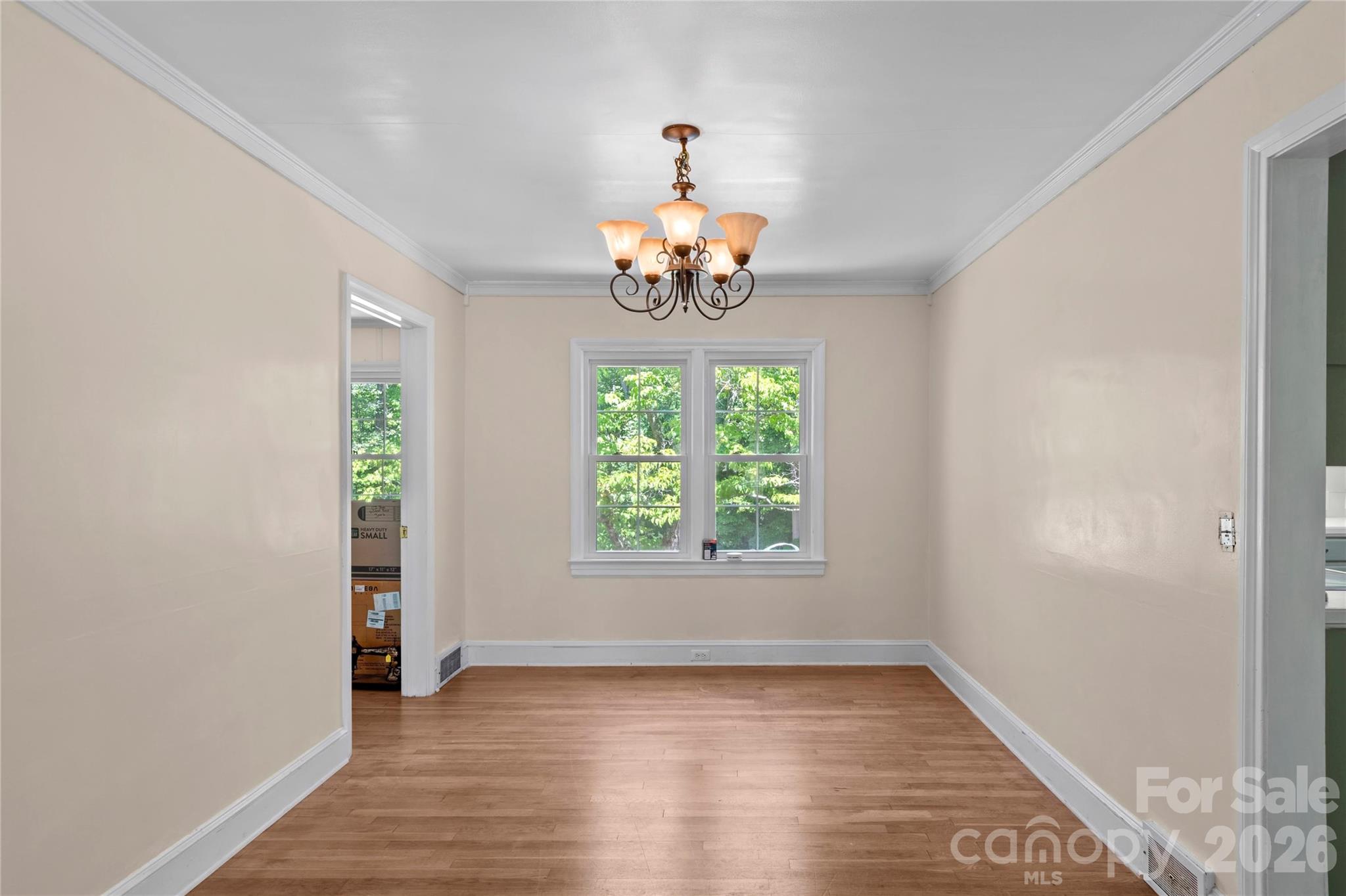951 Dodson Mill Road Pilot Mountain, NC 27041 - Photo 10 of 48 wooden floor in an empty room with a window